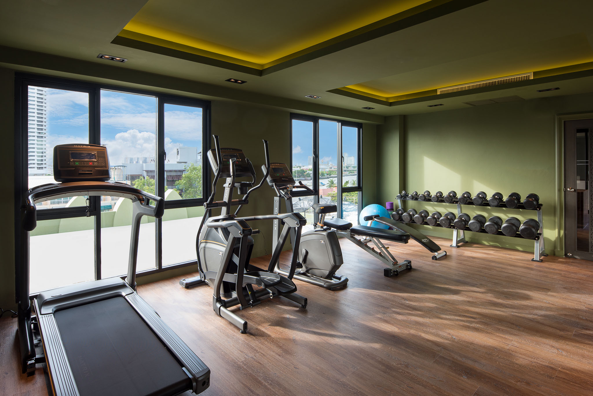 Hotel fitness centre with city views